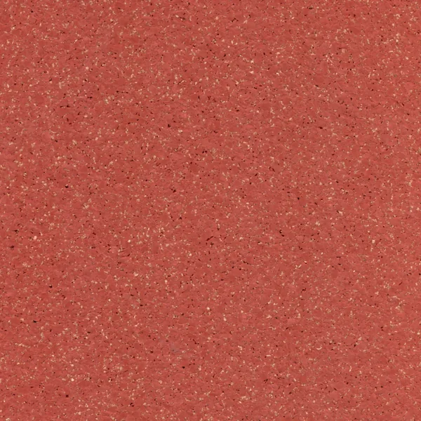 Red speckled flooring with lighter flecks