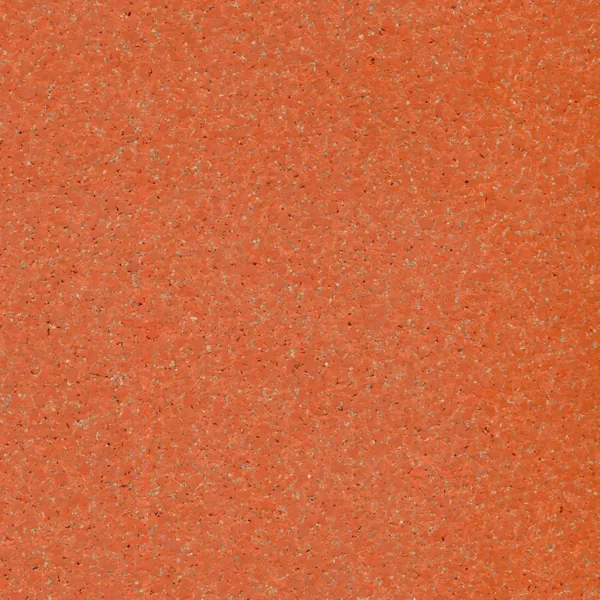 Reddish-orange speckled flooring with gray and black flecks