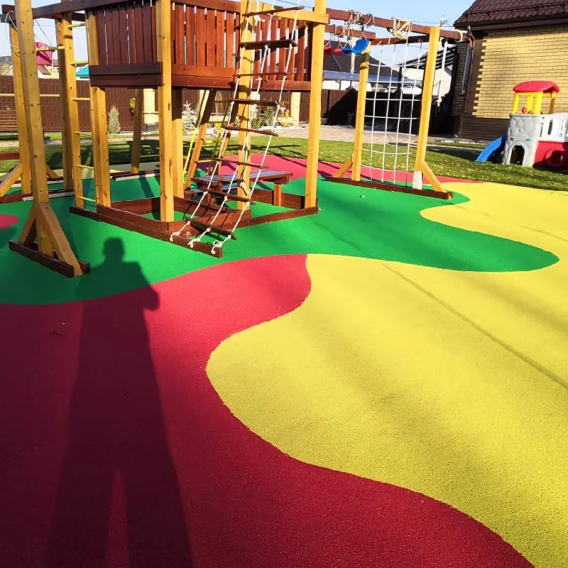 Colorful EPDM rubber-surface-with-red-yellow and green wavy patterns