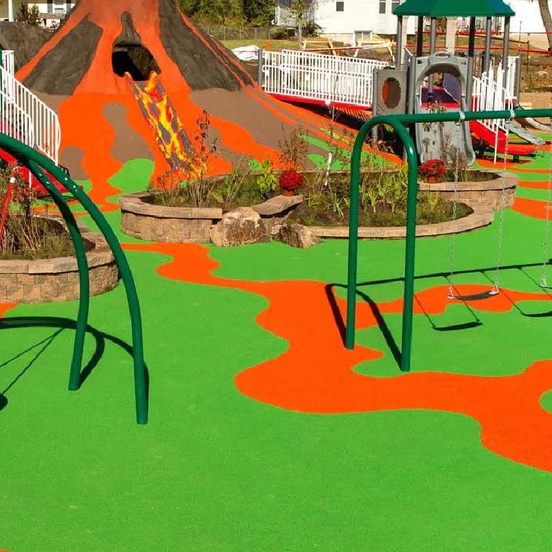 Green EPDM playground flooring with an orange winding path pattern.